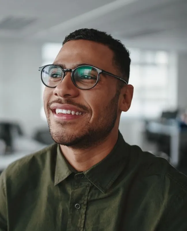 Man with flawless smile after restorative dentistry